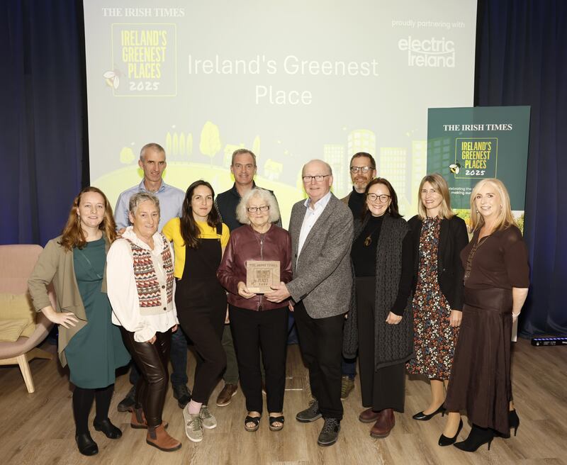 Irish Times Environment Editor Kevin O'Sullivan (centre) pictured with a group representing the Dingle peninsula, which was awarded Ireland's Greenest Place, along with Lisa Browne of Electric Ireland. Photograph: Kieran Harnett
