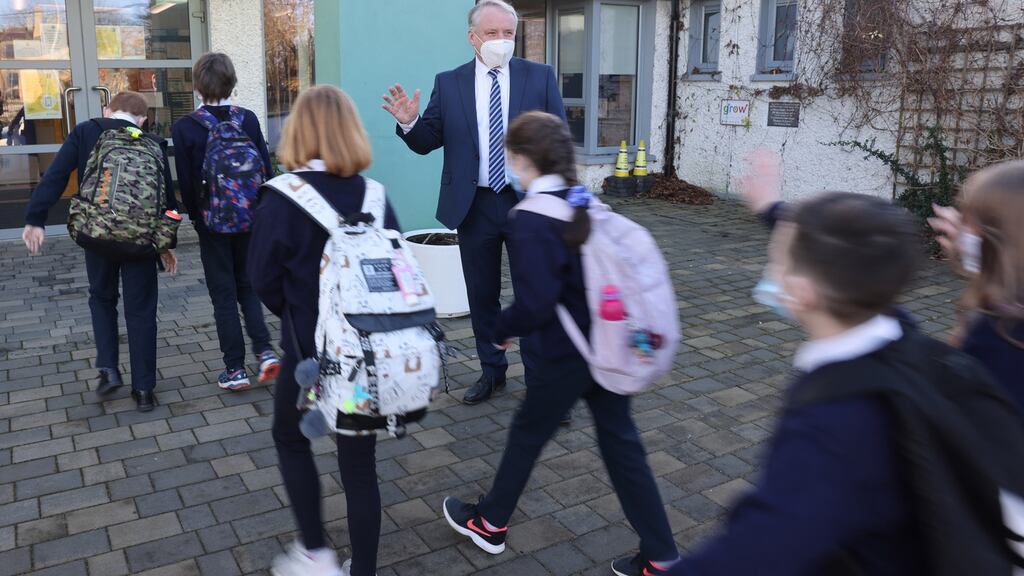 Bryan Collins, principal ofScoil Náisiúnta Naomh Feichín, Termonfeckin, Co Louth, greets pupils arriving to school. Photograph: Dara Mac Dónaill