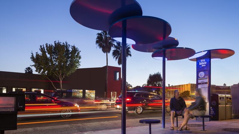 Bus shelters in Santa Monica, with disc-like canopies designed by Lorcan O’Herlihy