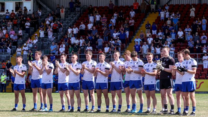 The Monaghan senior football team stand for a minute’s silence   before the Ulster semi-final. Photograph: Laszlo Geczo/Inpho