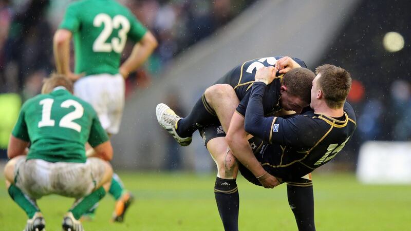 Duncan Weir and Stuart Hogg celebrate Scotland’s 2013 Six Nations win over Ireland. Photograph: Dan Sheridan/Inpho