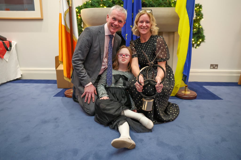 Sinéad Fidgeon and Martin McBreen, who were presented with Oireachtas Human Dignity Award, with daughter Grace. Photograph: Enda O'Dowd