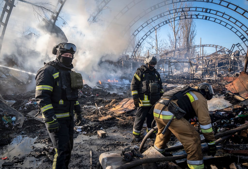 Ukrainian firefighters work at the site of a Russian airstrike in Sloviansk, Donetsk region, eastern Ukraine. Photograph: EPA