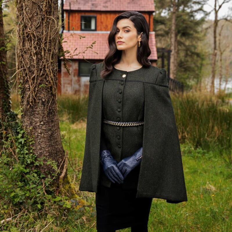 Tailored cape jacket (€320), skirt (€145)