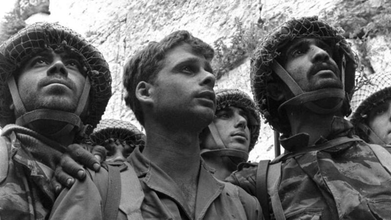 Israeli paratroopers   in front of the Western Wall in Jerusalem’s Old City in  1967 after it was captured during the   Six-Day War.  Photograph: David Rubinger/Reuters