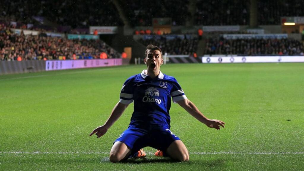 Everton’s Seamus Coleman celebrates scoring his side’s first goal during the Premier League match against Swansea at the Liberty Stadium. Photograph: Nick Potts/PA