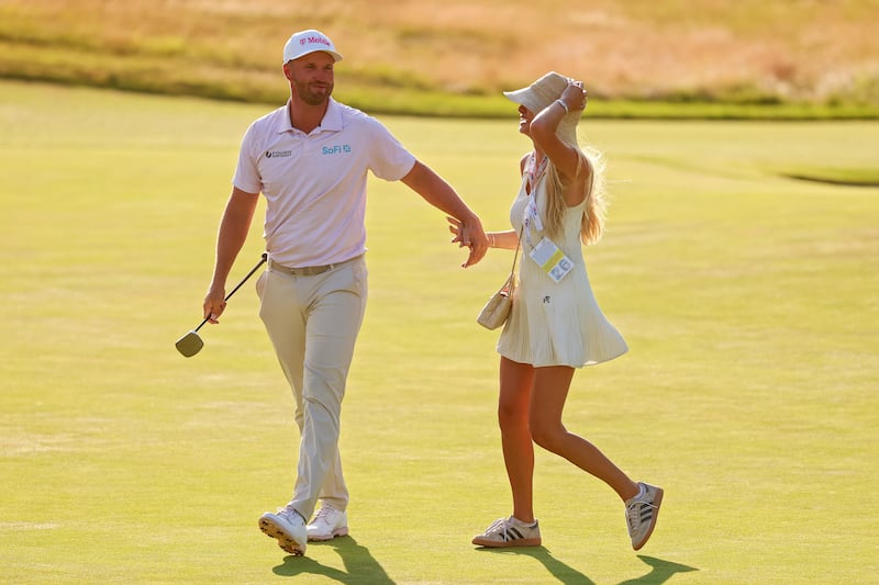 Wyndham Clark celebrates with girlfriend Emily Tanner after winning the 126th US Open. Photograph: Warren Little/Getty Images