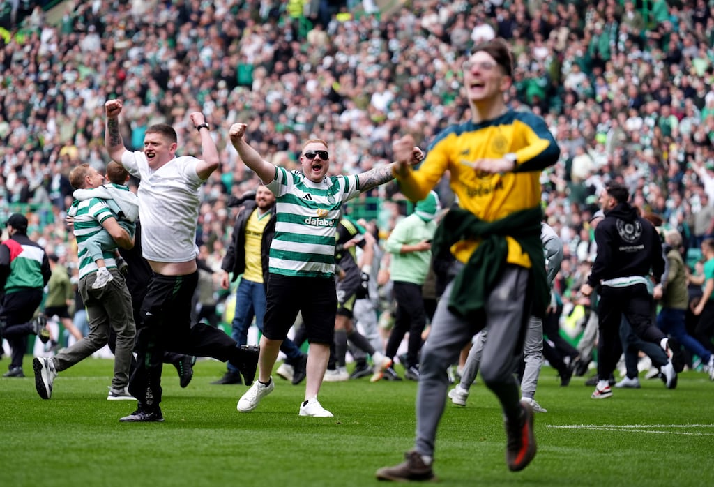 Celtic fans invaded the pitch with a minute still to play in Saturday's title decider against Hearts at Celtic Park. Photograph: Andrew Milligan/PA Wire