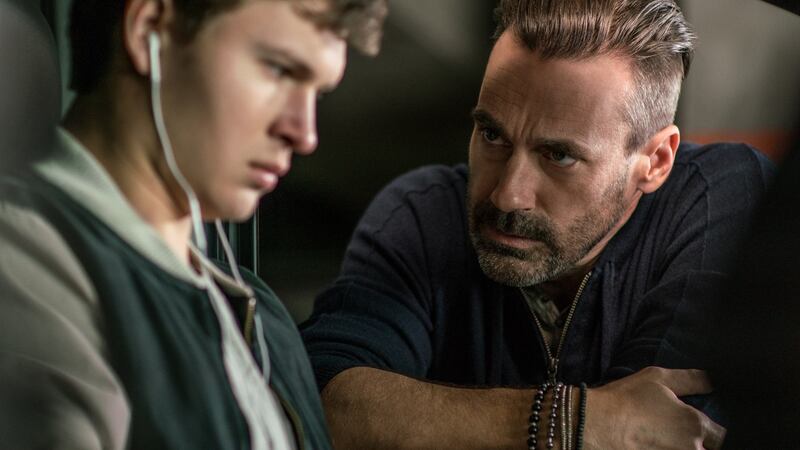 Ansel Elgort and  Jon Hamm in Baby Driver