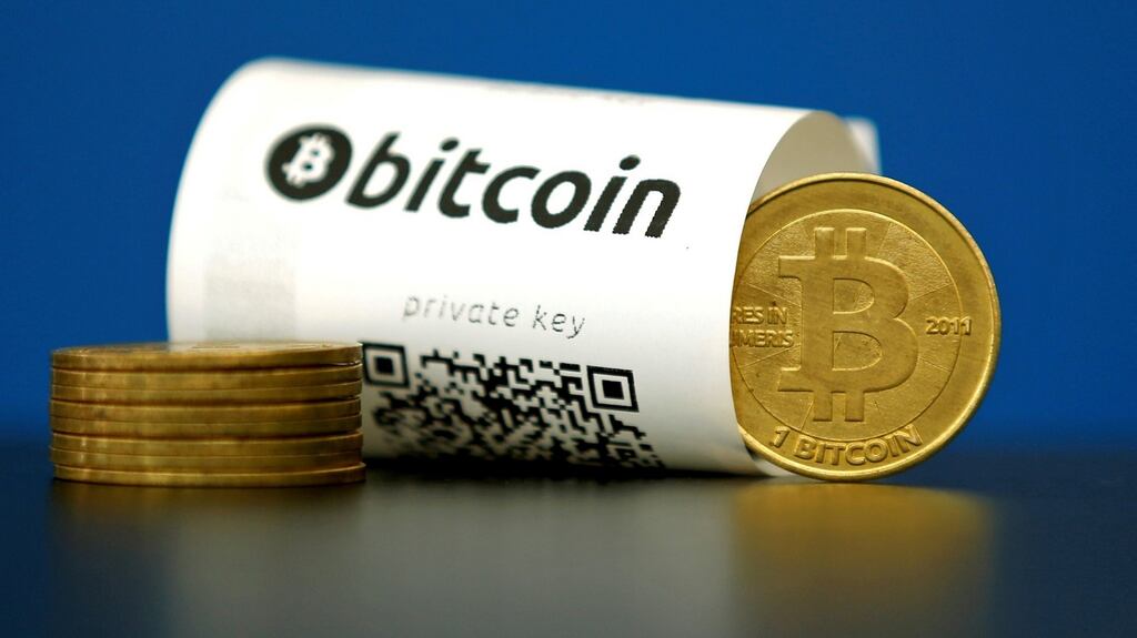 Bitcoin: underpinned by blockchain technology. Photograph: REUTERS/Benoit Tessier