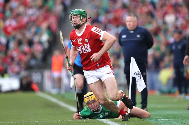 Cork's Séamus Harnedy eludes Limerick's Limerick's Cathal O’Neill . Photograph: Bryan Keane/Inpho