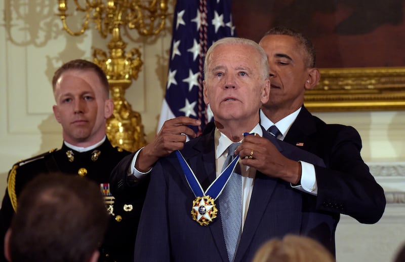 Then-president Barack Obama presents then-vice president Joe Biden with the Presidential Medal of Freedom during a ceremony in 2017. Photograph: Susan Walsh/AP