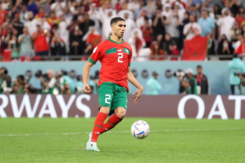 Achraf Hakimi of Morocco scores panenka penalty. Photograph: Catherine Ivill/Getty