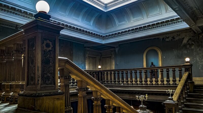 The brightly-lit staircase.