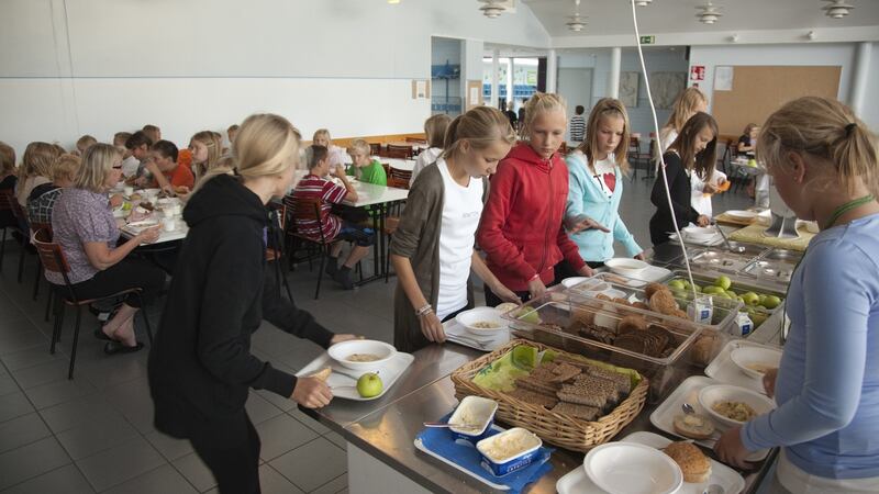 Children having lunch at school in Finland. Every child is entitled to a hot meal every day. Photograph:  Fishman Ullstein/Getty