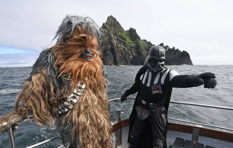 Fans in Star Wars costume visiting Skellig Michael, which was featured in two Star Wars movies. Star Wars fans occasionally gather in nearby Portmagee, Co Kerry, for  fun events, ranging from trad music sessions and set dancing to a drive-in cinema showing Star Wars movies.