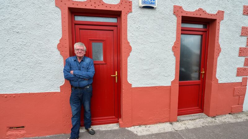 Artist Tomás Ó Cíobháin outside the old post office he bought in Ballyferriter after he was refused planning permission to build in his home in Gráig, west Kerry. Photograph: Domnick Walsh
