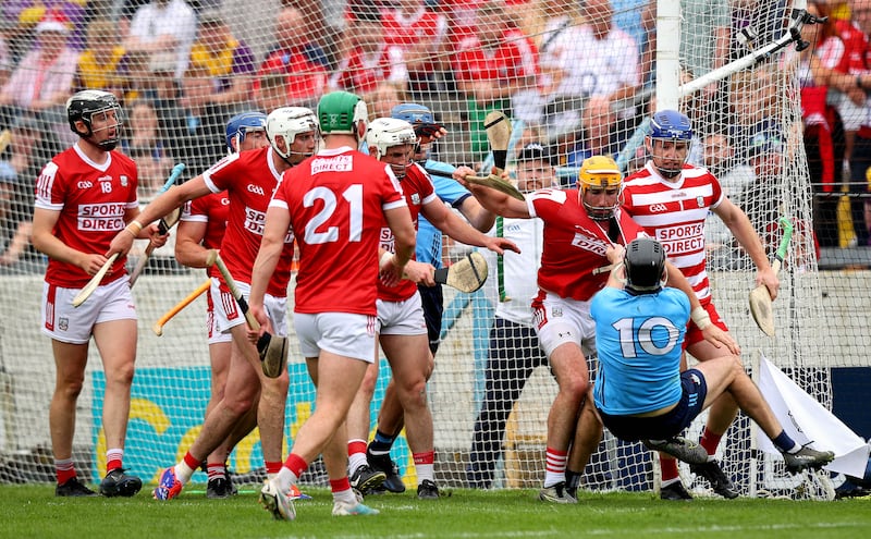 Dublin’s Danny Sutcliffe and Declan Dalton of an unconvincing Cork during the All-Ireland hurling quarter-final at Semple Stadium on Saturday. Cork emerged victorious from the fixture. Photograph: Ryan Byrne/Inpho