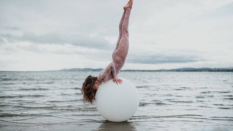 Emily Aoibheann with the 'giant peral' created by Liing Heaney for her show Mother of Pearl. Photograph: Emilia Pason