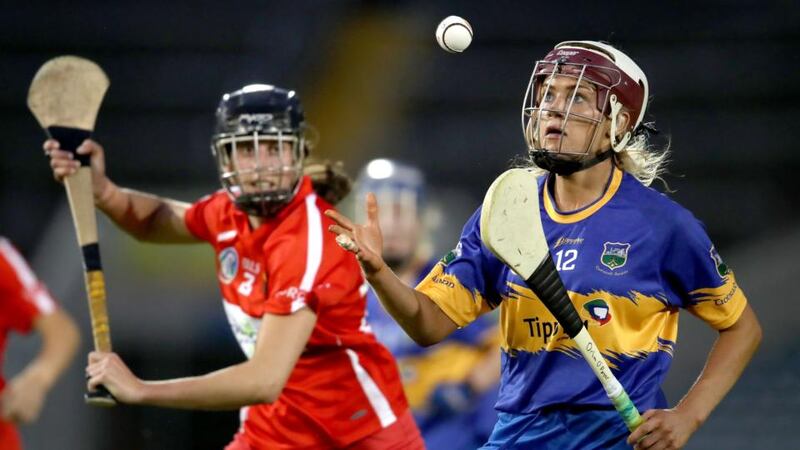 Orla O’Dwyer of Tipperary and  Cork’s Orla Cotter in action during the  Liberty Insurance All-Ireland Senior Camogie Championship semi-final at Semple Stadium in Thurles. Photograph:  Bryan Keane/Inpho