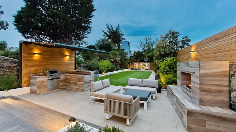 Outside there’s a  breakfast bar and a Beefeater barbecue supplied by The Outdoor Scene. The cooking area is covered over while across the way a wall-mounted gas fire burns at the flick of a switch