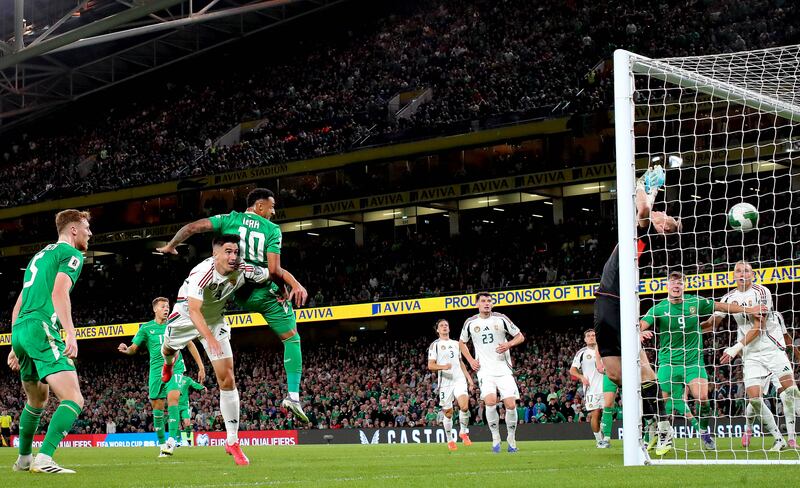 Adam Idah heads home Ireland's injury-time equaliser against Hungary in Saturday night's World Cup qualifier at the Aviva Stadium. Photograph: Ryan Byrne/Inpho