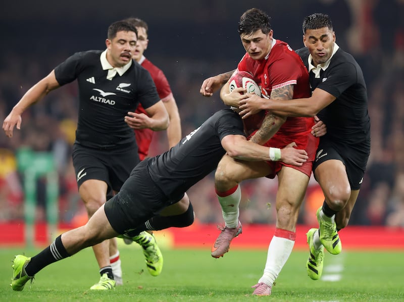Wales' Louis Rees-Zammit is tackled by New Zealand's Will Jordan and Rieko Ioane. Photograph: David Rogers/Getty Images