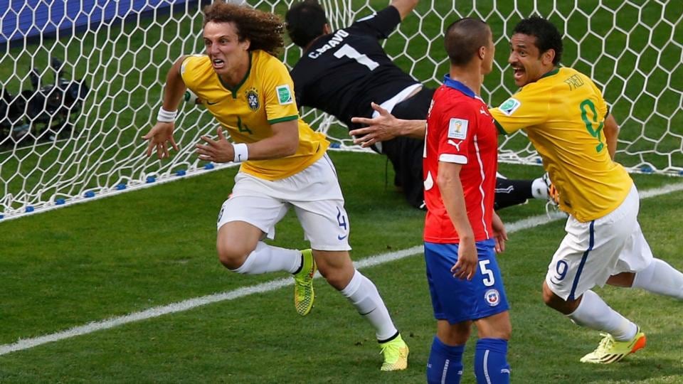 Brazil’s David Luiz celebrates scoring against Chile at the Mineirao Stadium in Belo Horizonte. Photograph: Leonhard Foeger / Reuters
