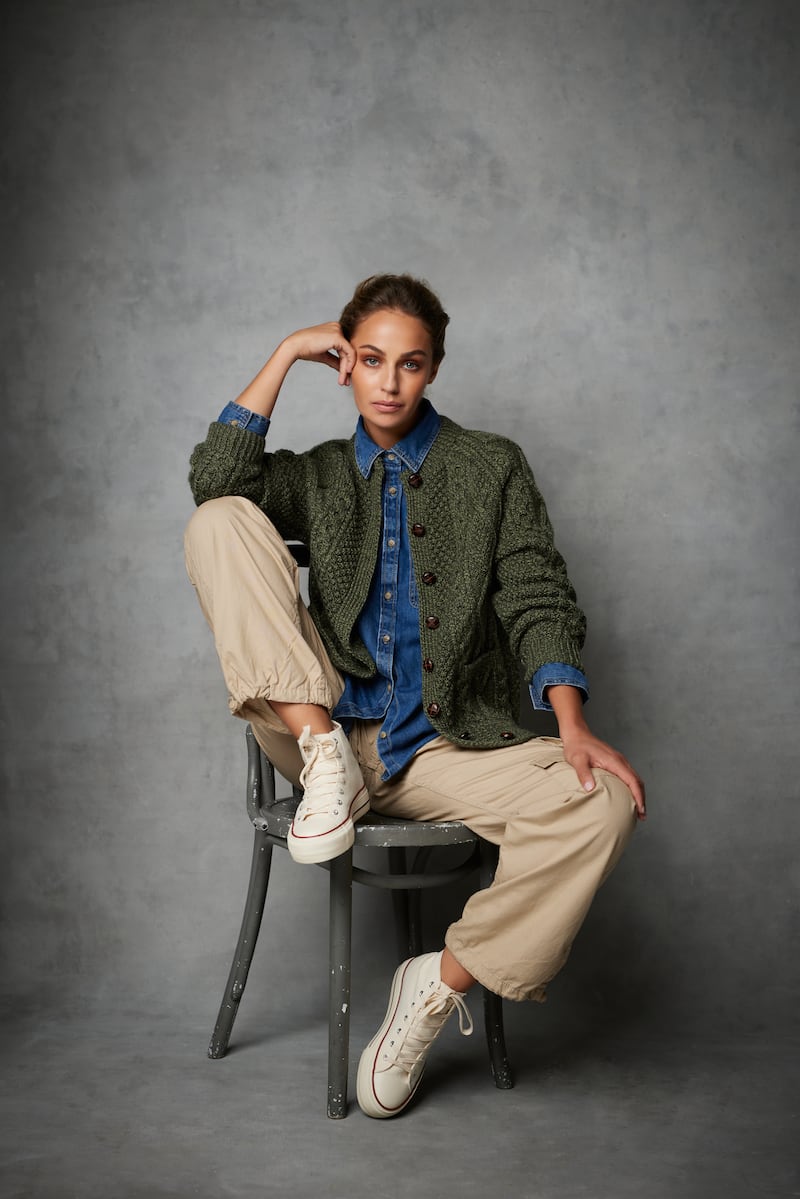 Her favourite shot in this collection is the moss green cardigan worn with a denim shirt and combats