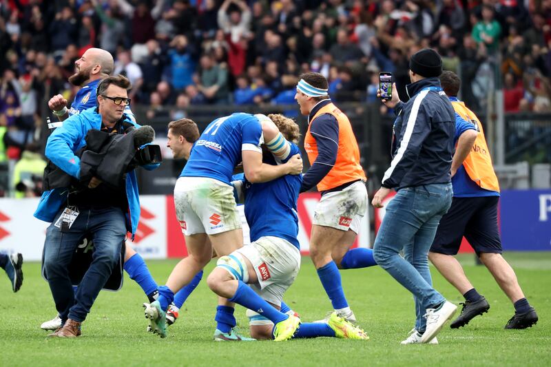 Louis Lynagh and Michele Lamaro of Italy celebrate after a famous victory for their team against Scotland. Photograph: Giampiero Sposito/Getty Images