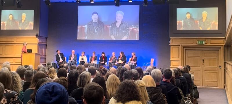 U2's The Edge and Adam Clayton addressing the Music Generation annual conference by videolink from Las Vegas. Photograph: Ronan McGreevy