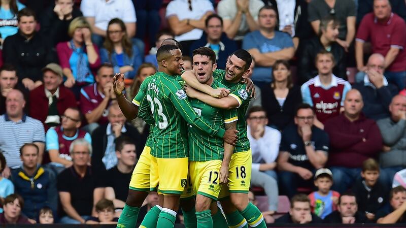 Robbie Brady  of Norwich City celebrates scoring the opening goal of the Premier League game against  West Ham at Upton Park. Photograph: Justin Setterfield/Getty Images