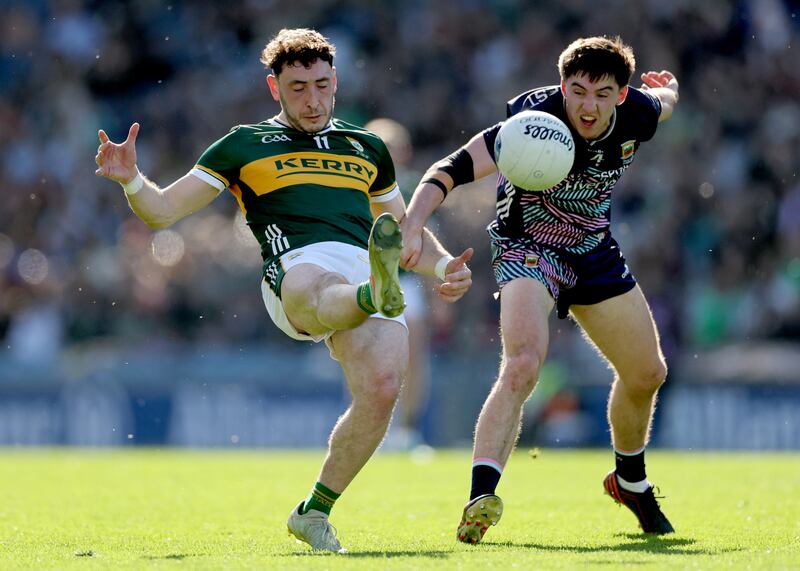 Kerry’s Paudie Clifford and Enda Hession of Mayo. Photograph: James Crombie/Inpho