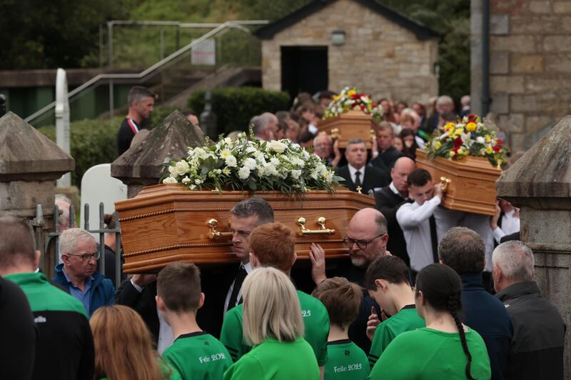The coffins of murder victims Vanessa Whyte and her children Sara and James Rutledge are carried from St Mary's Church in Maguiresbridge, Co Fermanagh, following a service of removal. Photograph: Liam McBurney/PA Wire