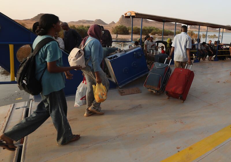 People crossing the border from Sudan at Abu Simbel, southern Egypt, Photograph: Khaled Elfiqi/EPA