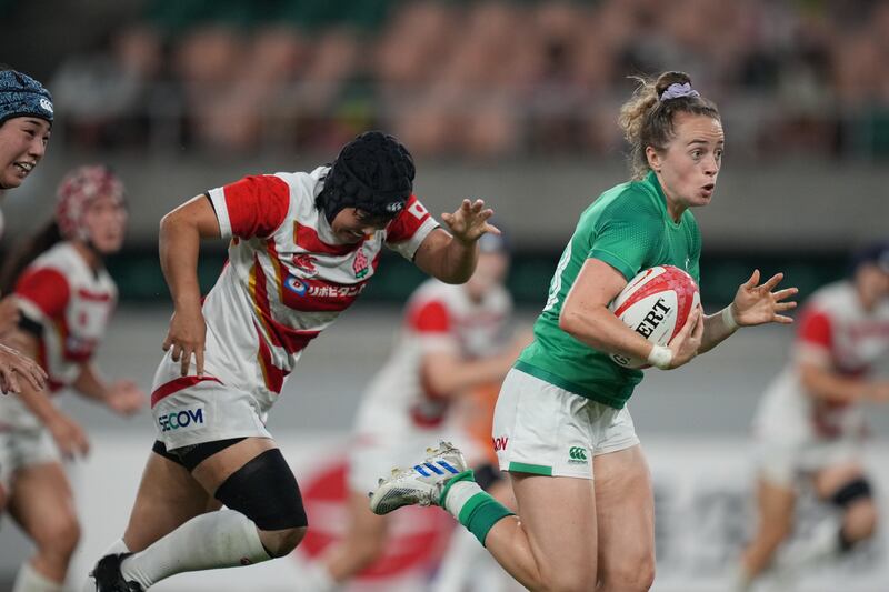 Ireland's Molly Scuffil-McCabe runs in for a long range try. Photograph: Akito Iwamoto/Inpho