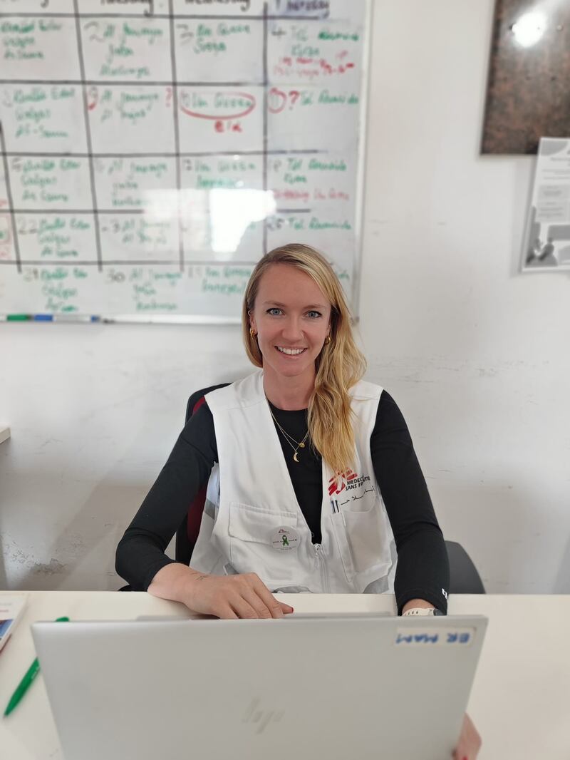 Chantelle Ní Chróinín at work. Her colleagues are routinely stopped at Israeli military checkpoints.