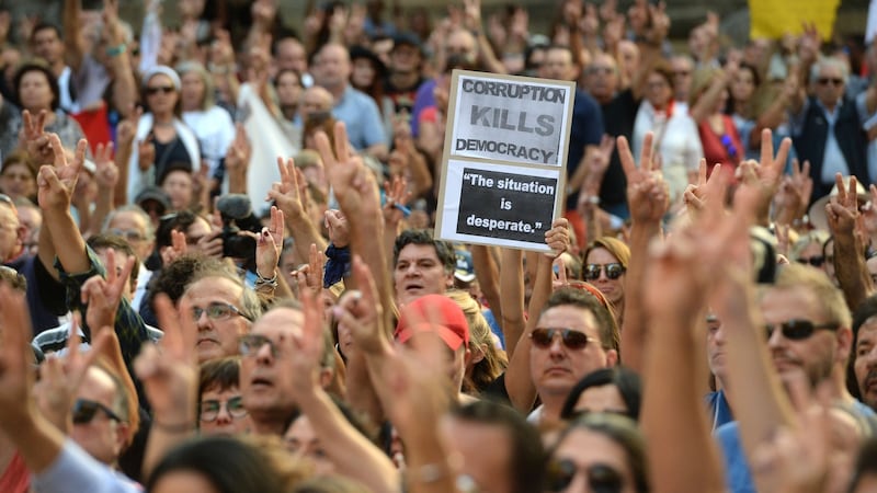 Thousands gather for a national rally to demand justice for murdered Maltese journalist and anti-corruption blogger Daphne Caruana Galizia in the island’s capital Valletta on October 22nd, 2017. Photograph:  Matthew Mirabelli/AFP/Getty Images