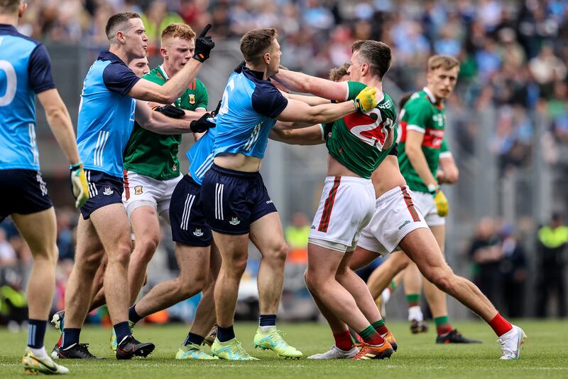 Tempers flare between Dublin's Brian Fenton and Cillian O’Connor of Mayo. Photograph: Ben Brady/Inpho
