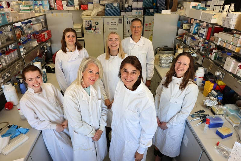 Prof. Jane Farrar and Dr Sophie Millington-Ward (centre front) with team from left; Laura Finnegan, Ella Kopcic, Iris Post, Arpad Palfi and Dr. Naomi Chadderton, in the Farran Lab at Trinity School of Genetics and Microbiology. Photograph: Dara Mac Dónaill 








