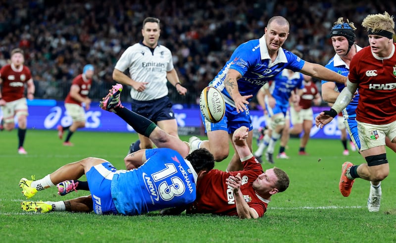 Finn Russell is tackled by Matty Proctor of Western force. Photograph: Dan Sheridan/Inpho