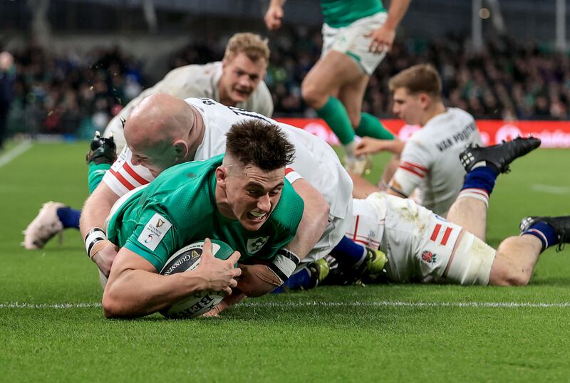 Dan Sheehan scores Ireland's third try despite the efforts of England's Dan Cole at the Aviva Stadium. Photograph: Dan Sheridan/Inpho 
