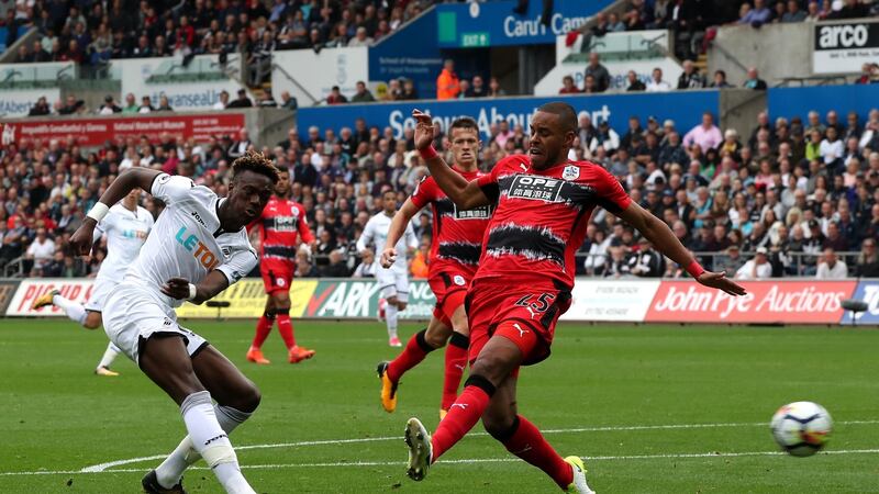Swansea City’s Tammy Abraham shoots at goal during the Premier League game against Huddersfield Town  at the Liberty Stadium.  Photograph: Nick Potts/PA Wire