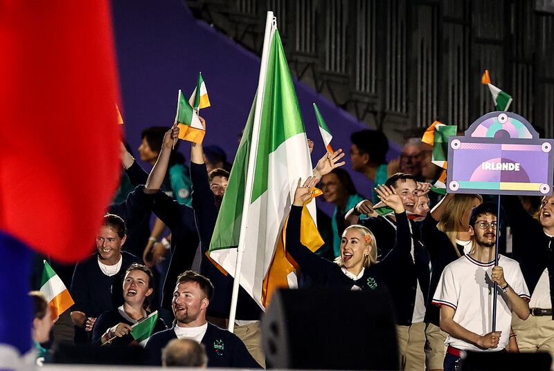 Flag-bearers Colin Judge and Orla Comerford with Team Ireland during the opening ceremony of the 2024 Paris Paralympic Games. Photograph: 
Tom Maher/Inpho