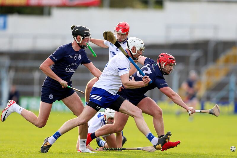 Denis Maher of Thurles Sarsfields and Kildangan’s Bryan McLoughney 
in the Tipperary Senior Hurling Championship final at FBD Semple Stadium in Thurles on October 15th. Photograph: Ken Sutton/Inpho