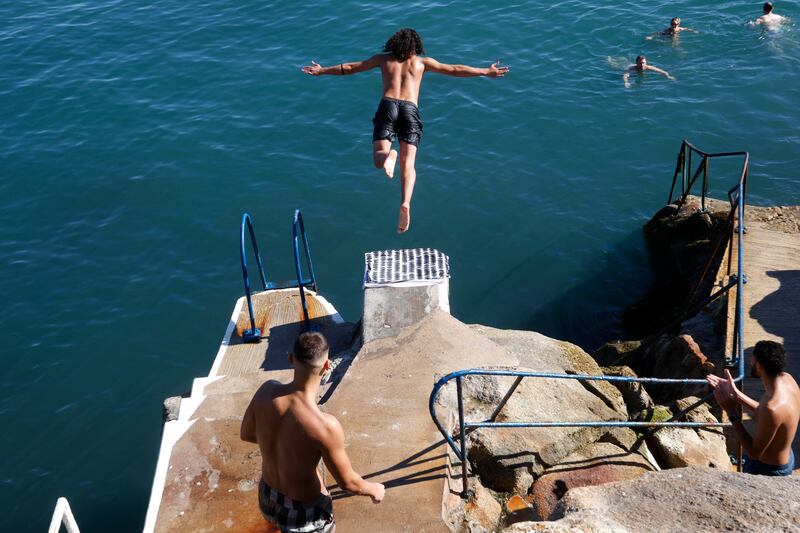 Swimmers enjoying the beautiful weather off the Hawk Cliff in Dublin.  Photograph: Nick Bradshaw