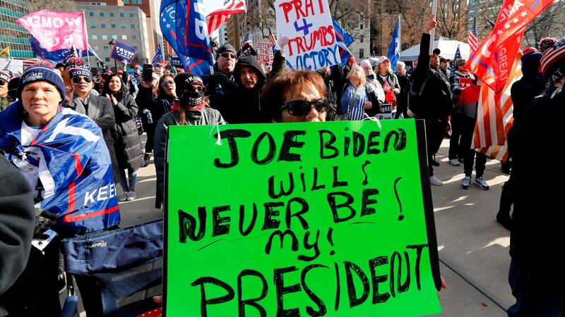 People gather at the Michigan State Capitol for a “Stop the Steal” rally in support of US President Donald Trump on Saturday. Photograph: Jeff Kowalsky/AFP/Getty
