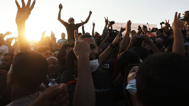 People cheer as Hamas leader Ismail Haniya speaks to protesters at the border fence with Israel  in Gaza City on Tuesday, a day after Israeli soldiers killed 60 Palestinians and wounded an estimated 2,700. Photograph: Spencer Platt/Getty Images