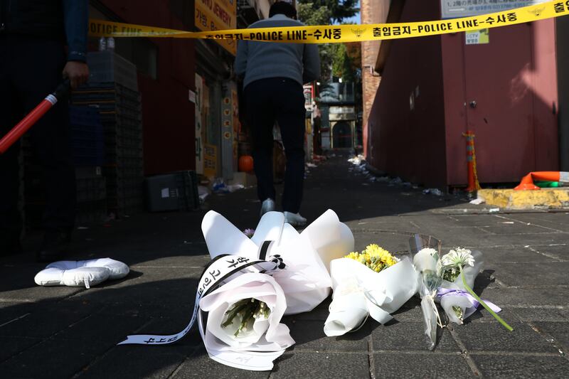 Flowers are laid at the scene of the deadly stampede in Seoul, South Korea. Photograph: Chung Sung-Jun/Getty Images