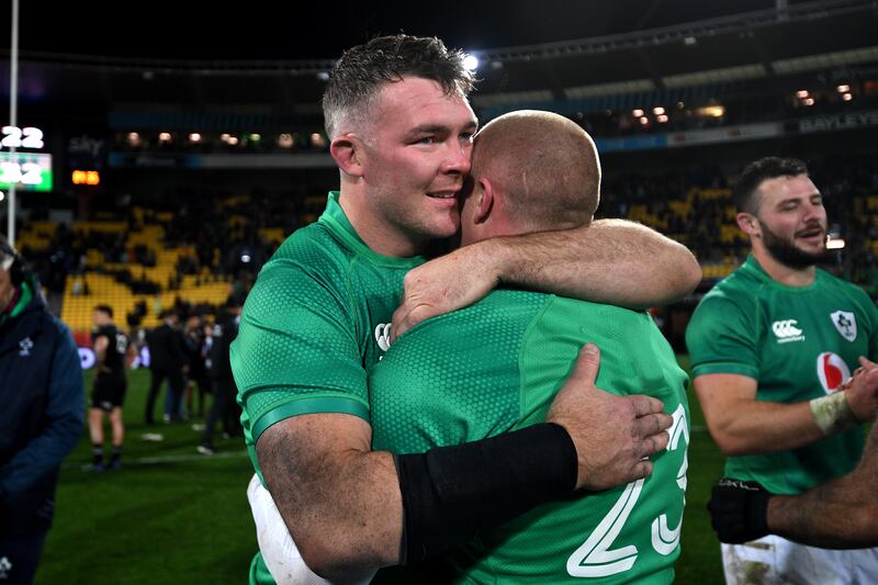 Peter O'Mahony hugs Keith Earls after victory over New Zealand in the third Test at Sky Stadium in Wellington. Photograph: Joe Allison/Getty Images